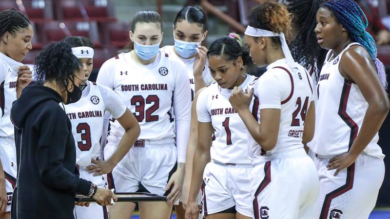 Coach Dawn Staley talks to her team bench the first half of action against Florida in the...