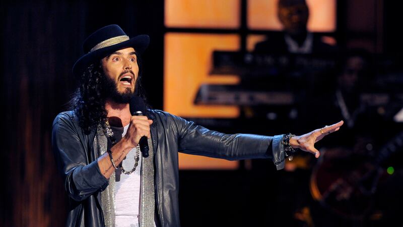 FILE - Comedian Russell Brand performs at "Eddie Murphy: One Night Only," a celebration of...