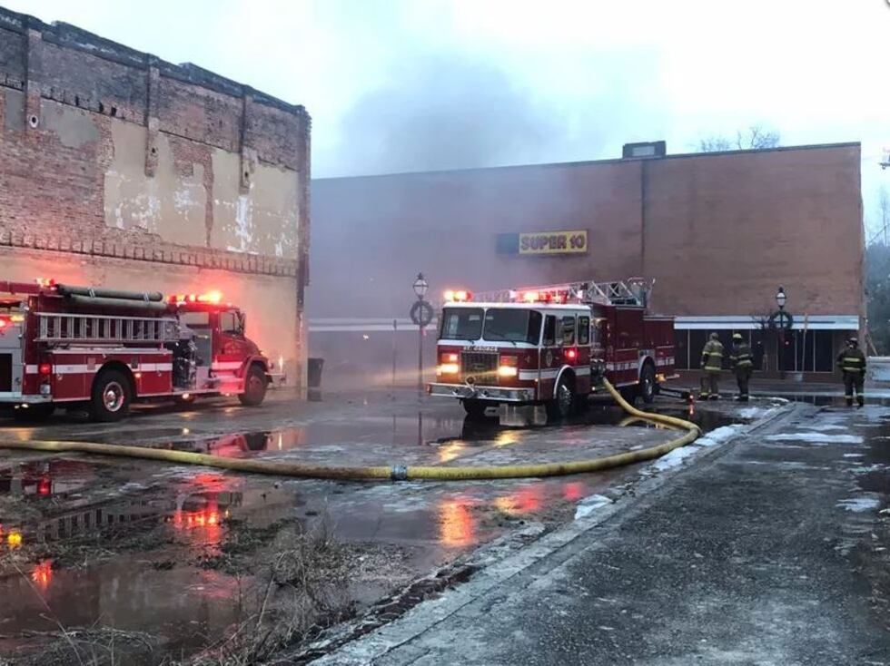 Dawn breaks on crews battling the Super 10 store fire in Holly Hill. Source: Alissa Holmes/Live 5