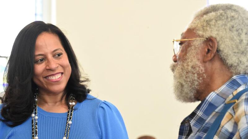 FILE PHOTO: State Sen. Mia McLeod, left, stands in the sanctuary of Shiloh Baptist, her...