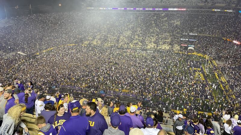 LSU fined after fans storm the field following win over Alabama in 2022.