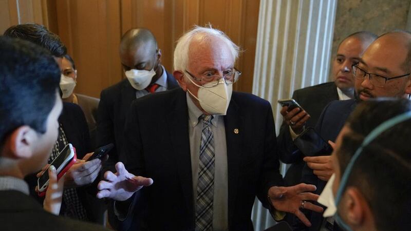 Sen. Bernie Sanders, I-Vt., speaks with reporters on Capitol Hill in Washington, Saturday,...