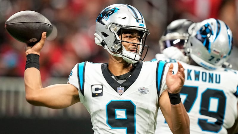 Carolina Panthers quarterback Bryce Young (9) throws in the pocket against the Atlanta Falcons...