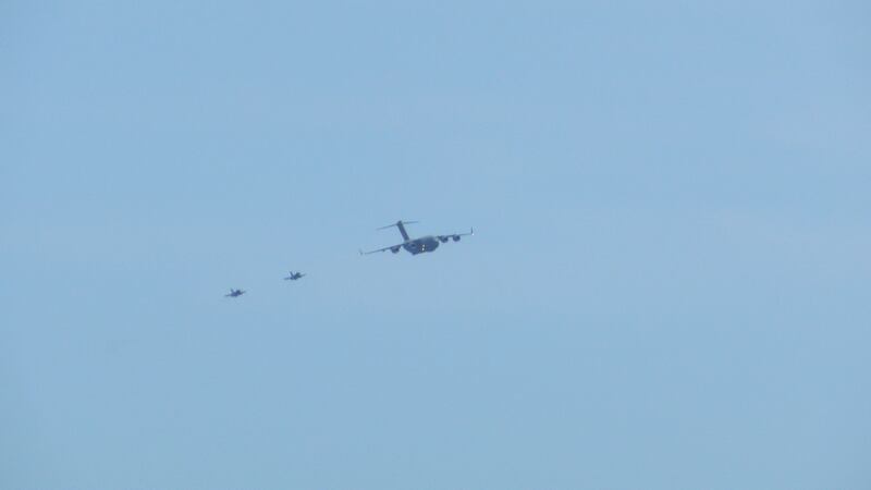 Two F-16s led the way, with a Charleston based C-17 Globemaster III flown by the 315th Airlift...