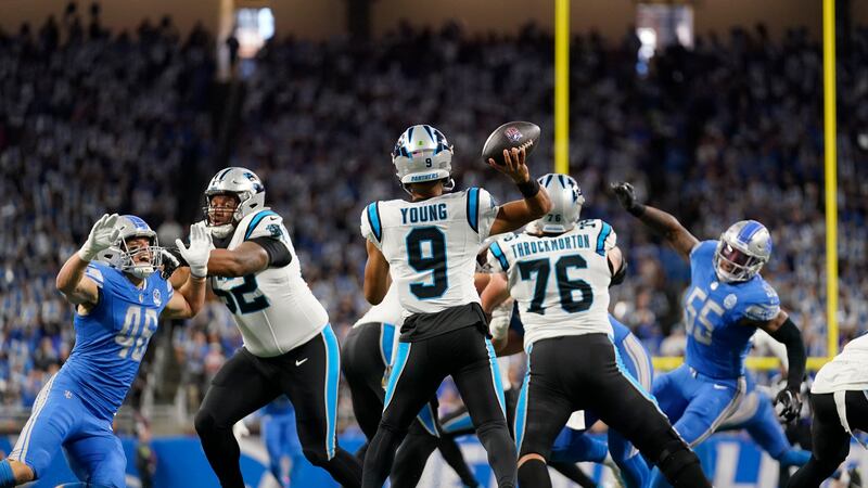 Panthers QB Bryce Young threw three touchdowns and two interceptions on Sunday against the Lions.