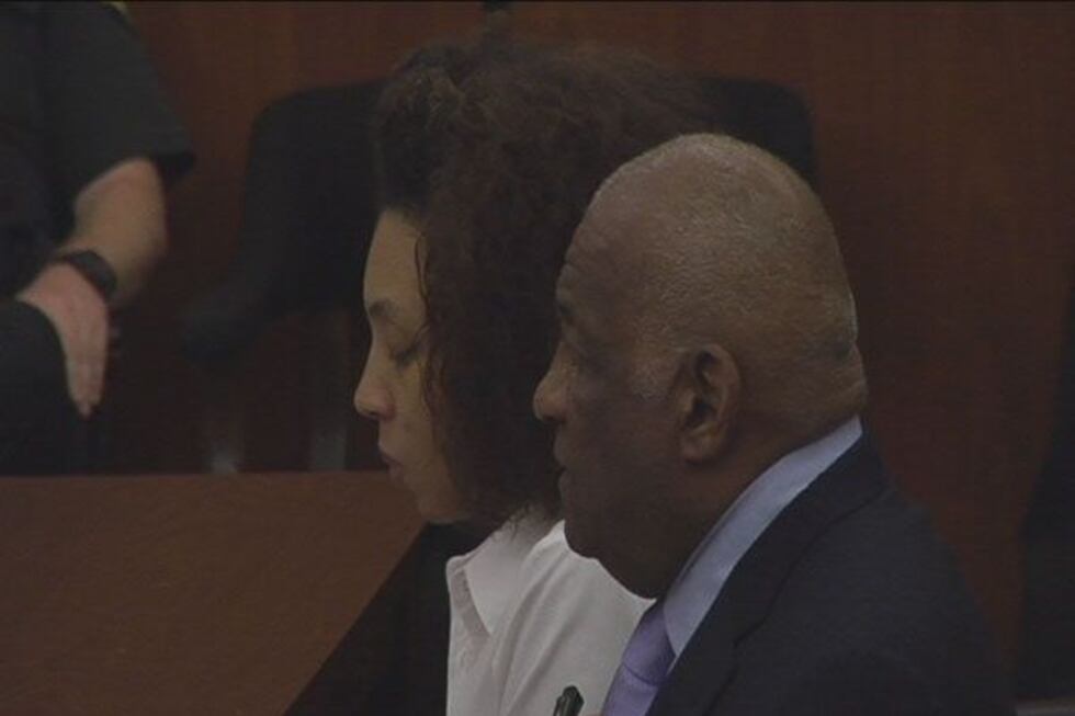 Zinah Jennings with her attorney during her trial.