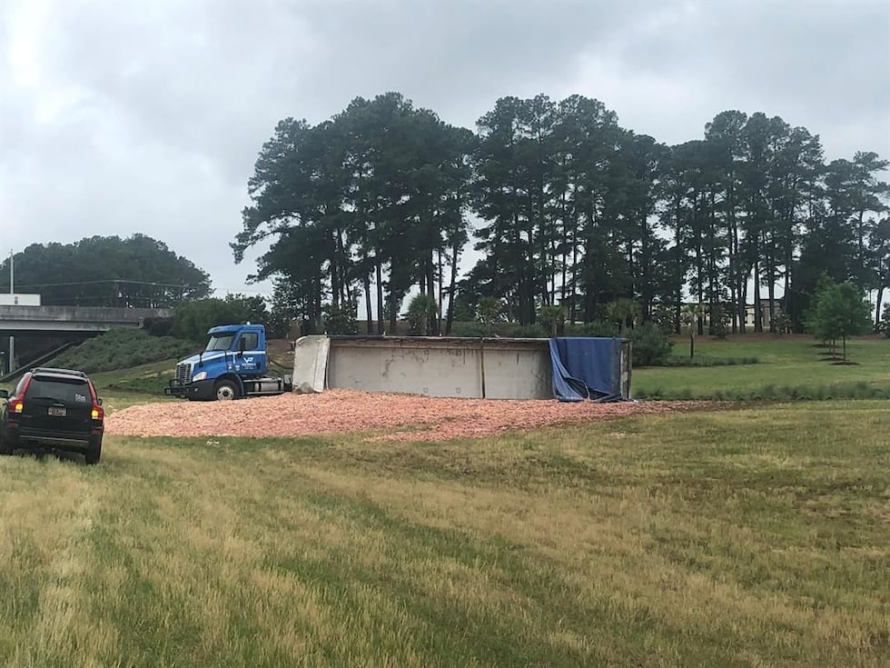 An overturned sumi truck has closed the I-20WB ramp from Sunset Blvd. (WIS)