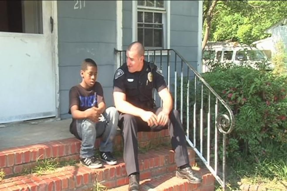 Cameron and Officer Gaetano Acerra